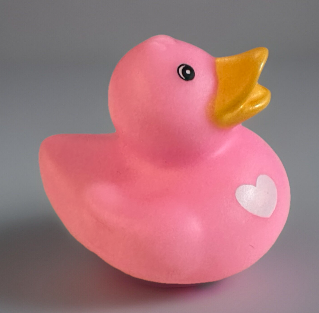 Pink rubber duck with hearts and a yellow beak from Reed’s Rubber Ducks and Sensory Shop