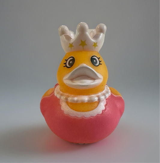 2 inch princess duck toy from Reed’s Rubber Ducks and Sensory Shop wearing a pink dress and white crown