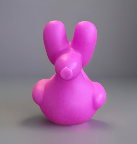 Purple rubber duck gift shaped like a a ballon animal with long ears from Reed’s Rubber Ducks and Sensory Shop