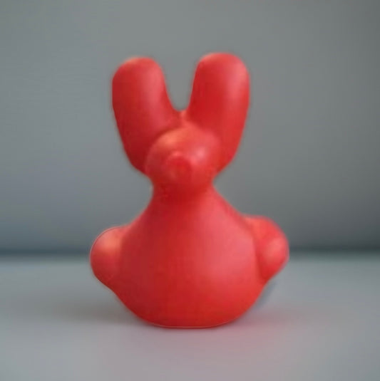 Red balloon animal rubber duck shaped like a bunny with rounded features from Reed’s Rubber Ducks and Sensory Shop