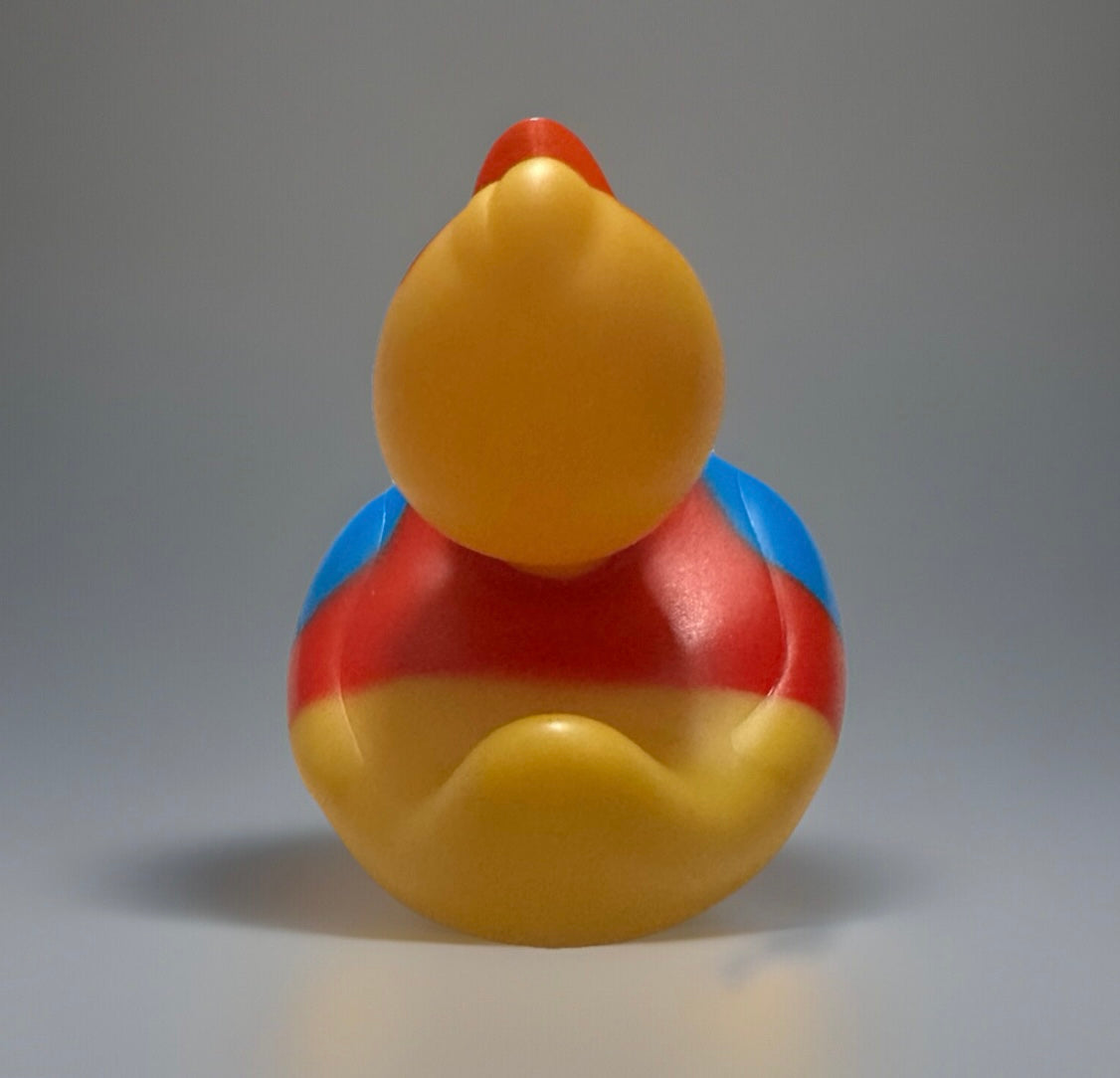 Brightly colored super hero rubber duck in red blue and yellow from Reed’s Rubber Ducks and Sensory Shop