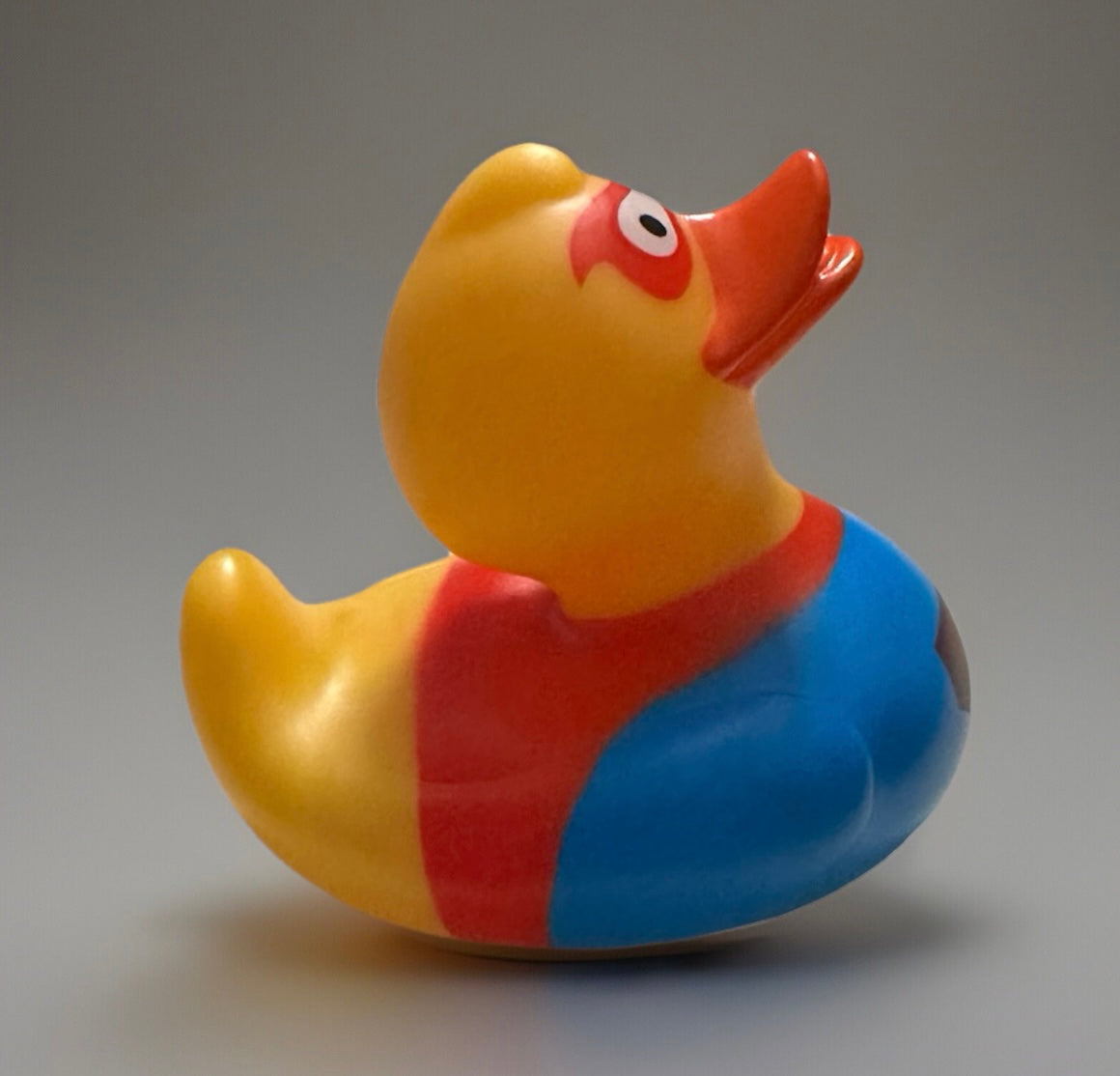 Yellow super hero rubber duck with red mask and blue costume from Reed’s Rubber Ducks and Sensory Shop