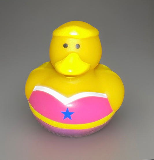 Superhero girl rubber duck in pink costume with blue star from Reed’s Rubber Ducks and Sensory Shop