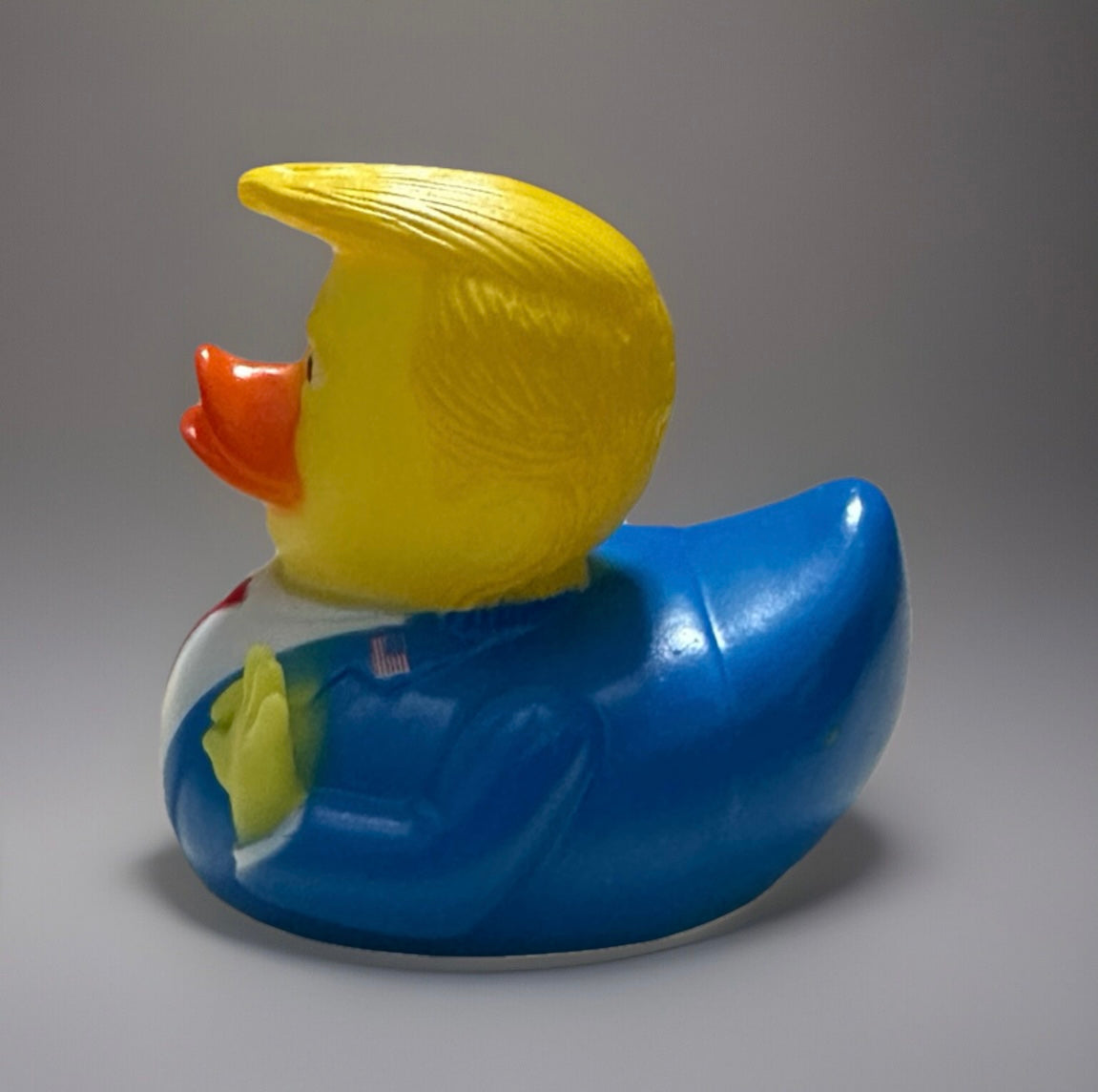 Trump rubber duck gift in blue suit with yellow hair and red tie from Reeds Rubber Ducks and Sensory Shop