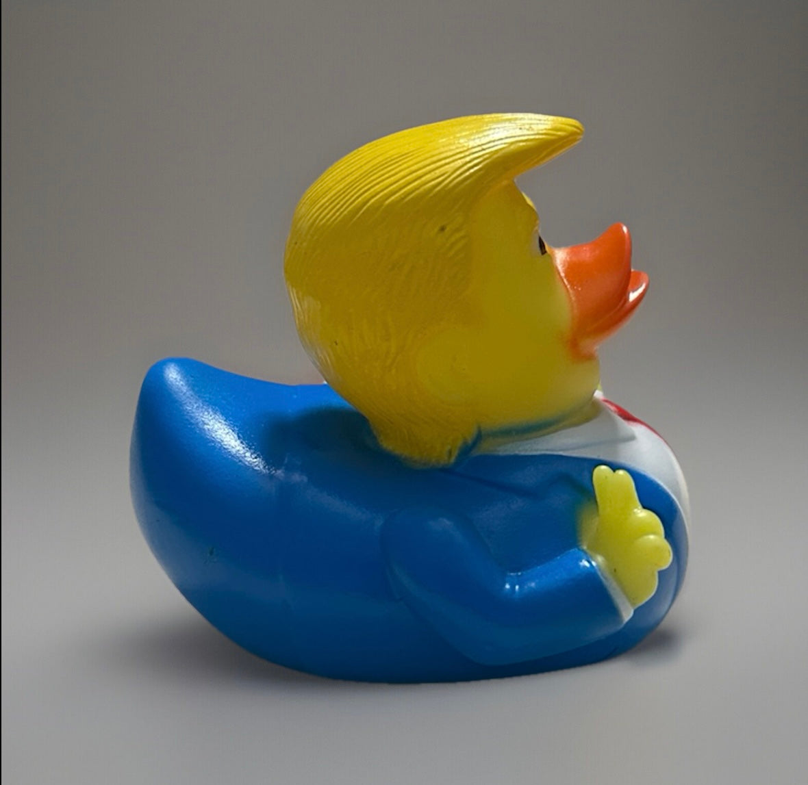 Trump rubber duck gift with yellow hair blue suit and red tie from Reeds Rubber Ducks and Sensory Shop