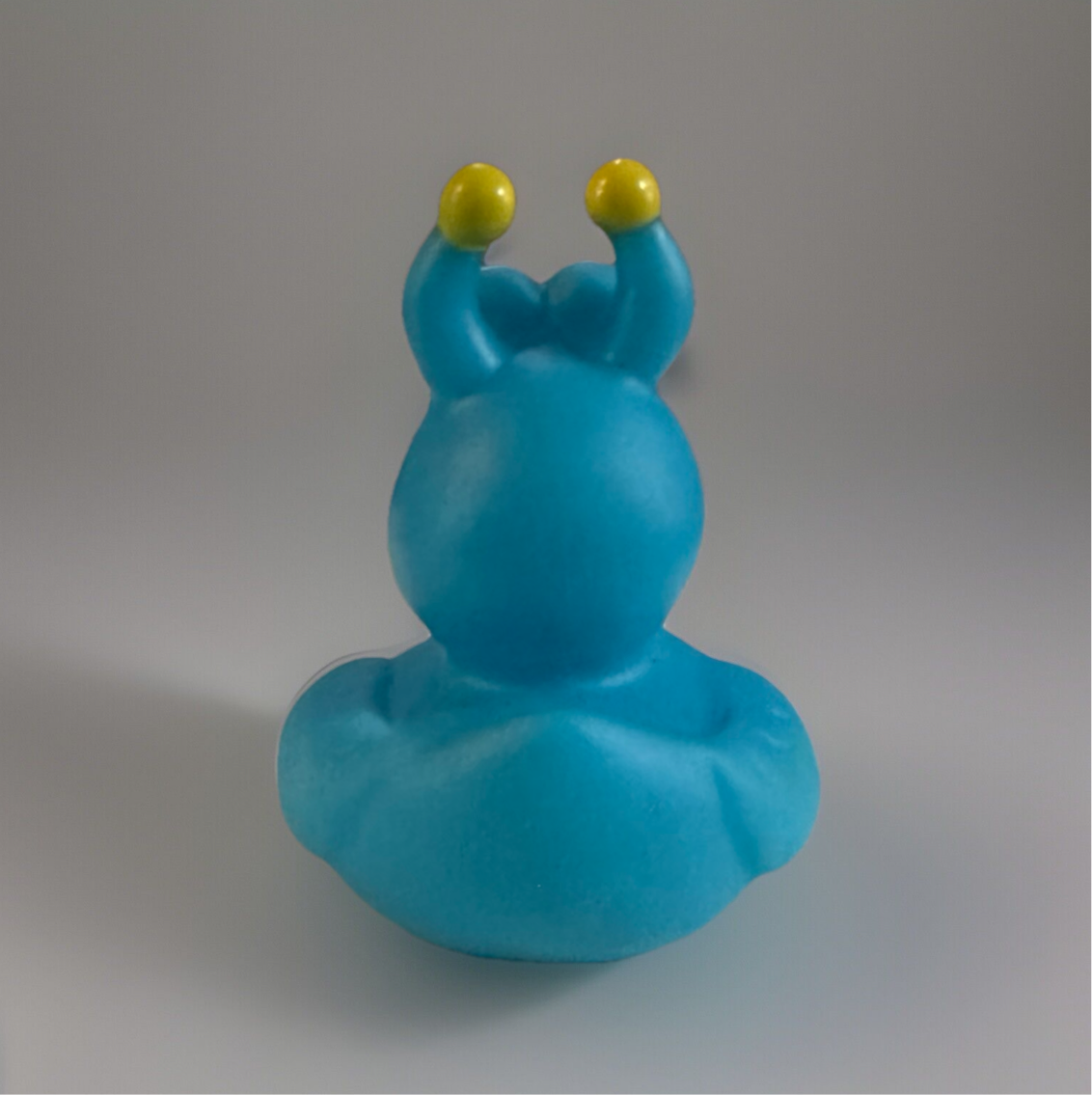 Back view of turquoise snail rubber duck with yellow antenna tips from Reed’s Rubber Ducks and Sensory Shop