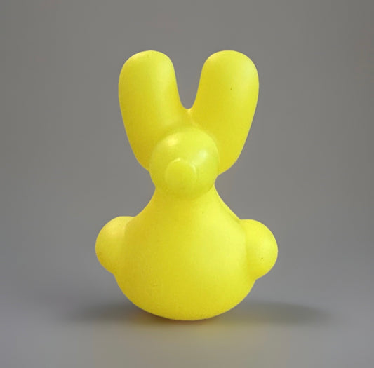 Yellow balloon animal rubber duck with bunny ears from Reed’s Rubber Ducks and Sensory Shop